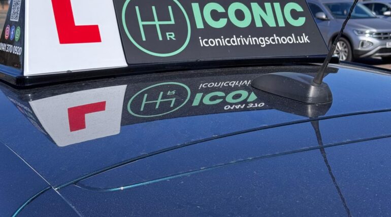 learner driver L plate sign on car roof for driving lessons in Glasgow